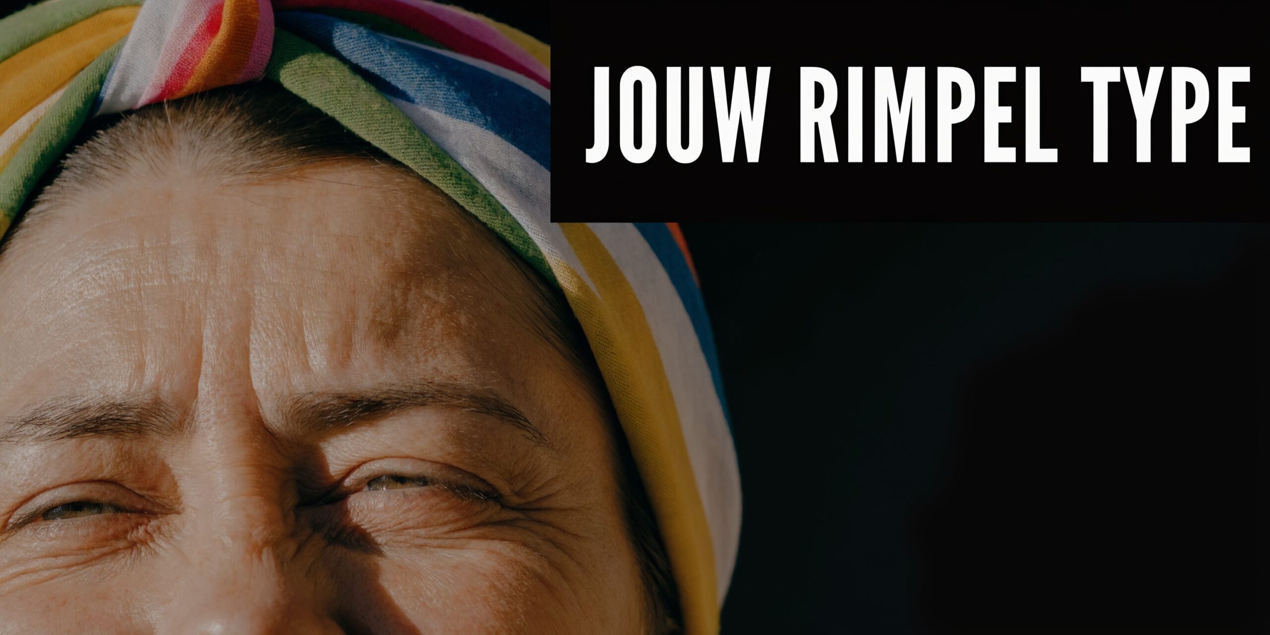 Een close-up van het voorhoofd van een vrouw met zichtbare expressielijnen en rimpels onder fel zonlicht.